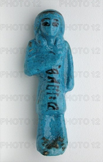 Shabti, Overseer of Tchenetipet, Third Intermediate Period, Dynasty 21 (1069 BC–945 BC), Egyptian, Thebes, Deir el-Bahri, Egypt, Faience, 9.75 × 3.5 × 2 cm (3 3/8 × 1 3/8 × 3/4 in.)