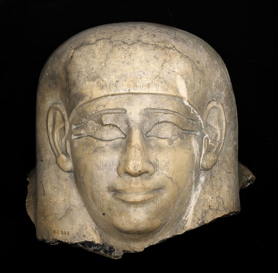 Head From a Sarcophagus, Ptolemaic Period (332 BC–30 BC), Egyptian, Egypt, Stone, 45.7 × 48.3 × 35.6 cm (18 × 19 × 14 in.) (appro×.)