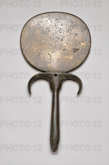 Hand Mirror, New Kingdom, Dynasty 18–20 (about 1550–1070 BC), Egyptian, Egypt, Copper alloy, 20 × 10.3 × 2.2 cm (7 7/8 × 4 1/16 × 7/8 in.)