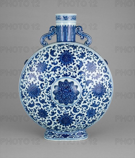 Moon Flask (Bianhu) with Lotus Scroll and Central Floret,Ruyi Mushrooms (base) and Plantain Leaves, Qing dynasty (1644–1911), Qianlong reign mark and period (1736–1795), China, Porcelain painted in underglaze blue, 49.3 × 37.2 × 20.3 cm (19 7/16 × 14 5/8 × 8 1/2 in.)