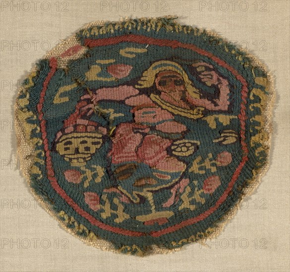 Fragment, Roman period (30 B.C.– 641 A.D.)/Arab period (641–969), 6th/8th century, Coptic, Egypt, Egypt, Linen and wool, tapestry weave, embroidery, 11.4 cm (4 1/2 in.) diameter