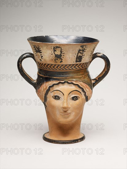 Kantharos (Wine Cup) in the Shape of a Female Head, about 480 BC, Greek, Athens, Attributed to the London Class (Class G), Athens, terracotta, white-ground and black-figure technique, 19 × 17.8 × 13.3 cm (7 1/2 × 7 × 5 1/4 in.)