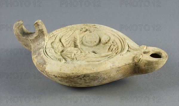 Lamp, 1st/2nd century AD, Roman, Italy, terracotta, 15 × 9.25 × 5 cm (5 7/8 × 3 5/8 × 2 in.)