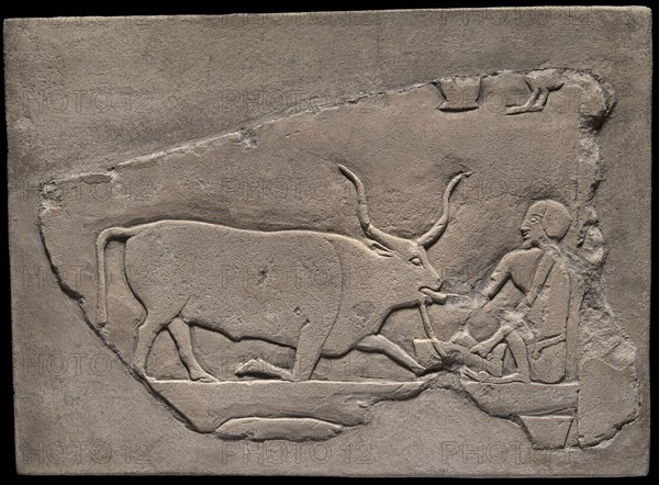 Wall Fragment from a Tomb Depicting a Herdsman, First Intermediate Period, Dynasties 9–10 (about 2060–2025 BC), Egyptian, Saqqara, Egypt, Limestone, 26.5 × 36 × 9 cm (10 7/16 × 14 3/16 × 3 1/2 in.)