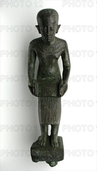Statuette of the God Imhotep, Third Intermediate Period–Late Period, Dynasties 25–26 (about 747–525 BC), Egyptian, Egypt, Bronze, 12.7 × 3.5 × 1.3 cm (5 × 1 3/8 × 1/2 in.)