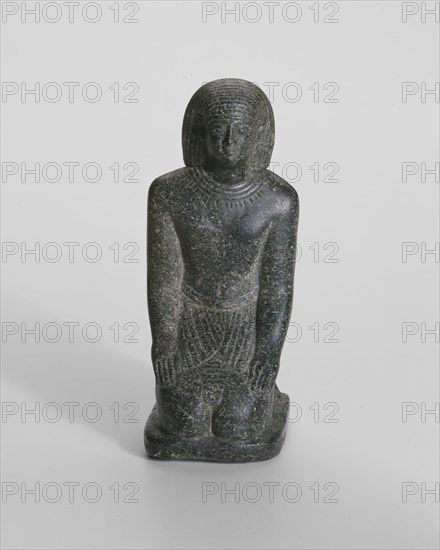 Statuette of Wesir-nakht, Late Period, Dynasty 31 (about 342–332 BC), Egyptian, Egypt, Stone, 16.5 × 6.6 × 8.5 cm (6 1/4 × 2 5/8 × 3 3/8 in.)