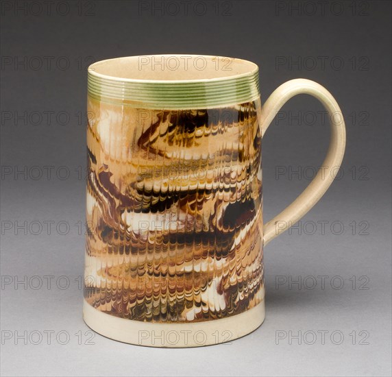 Tankard, c. 1810, England, Staffordshire, Staffordshire, Lead-glazed earthenware (marble creamware), H. 15.6 cm (6 1/8 in.), diam. 10.2 cm (4 in.)