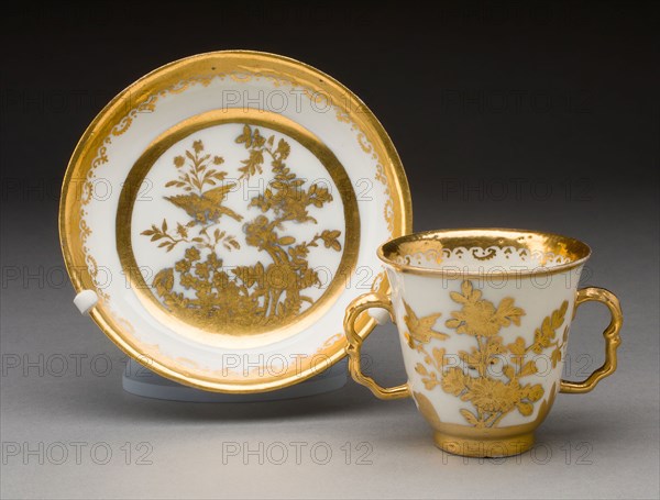 Two-handled Cup and Saucer, 1720/25, Meissen Porcelain Manufactory, German, founded 1710, Meissen, Hard-paste porcelain and gilding, Cup: H. 7 cm ( 2 3/4 in.) diam. 10.2 cm (4 in.), Saucer: H. 2.5 cm (1 in.), diam. 12.9 cm (5 1/16 in.)