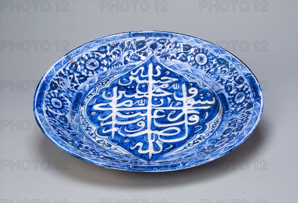 Dish, Qajar dynasty (1796–1925), dated 1822/1823 A.D., Iran, Iran, Fritware, painted in blue under a transparent glaze, H. 4.6 cm (1 13/16 in.),  Diam. 28 cm (11 1/16 in.)