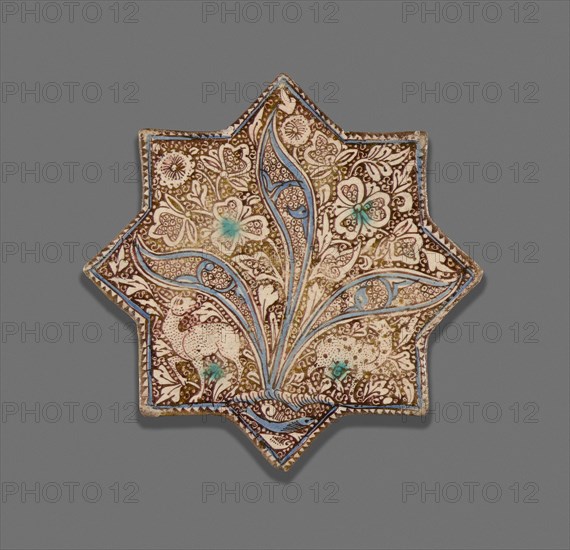 Star-Shaped Tile, Ilkhanid dynasty (1256–1353), c. 1300, Iran, Iran, Fritware painted in blue and turquoise in an opaque white glaze, with lustre over the glaze, 20.7 × 20.7 × 1.7 cm (8 3/16 × 8 3/16 × 1 in.)
