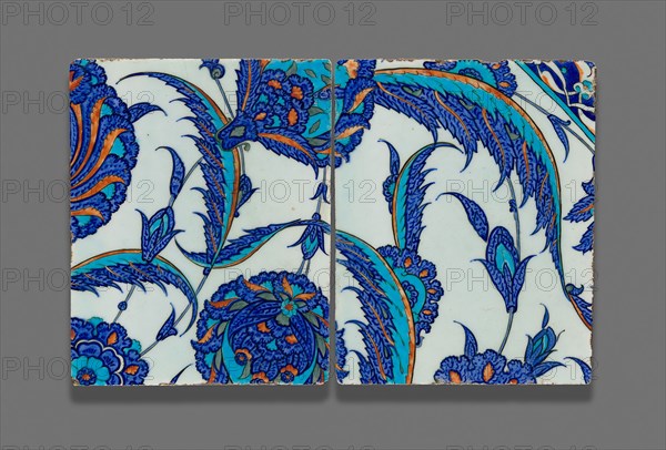 Two Tiles with Continuous Floral Pattern, Ottoman dynasty (1299–1923), c.1560, Turkey, Iznik, Iznik, Fritware, painted in blue, turquoise, red, green, and black under a transparent glaze, A: 27.9 × 22.2 × 2 cm (11 × 8 3/4 × 7/8 in.), B: 27.9 × 22.4 × 2.1 cm (11 3/8 × 8 13/16 × 7/8 in.)