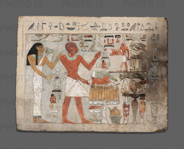 Stela of Amenemhat and Hemet, Middle Kingdom, early Dynasty 12 (about 1956–1877 BC), Egyptian, probably from Thebes, Egypt, Egypt, Limestone and pigment, 31.1 × 41.7 × 6.7 cm (12 1/4 × 16 3/8 × 2 5/8 in.)