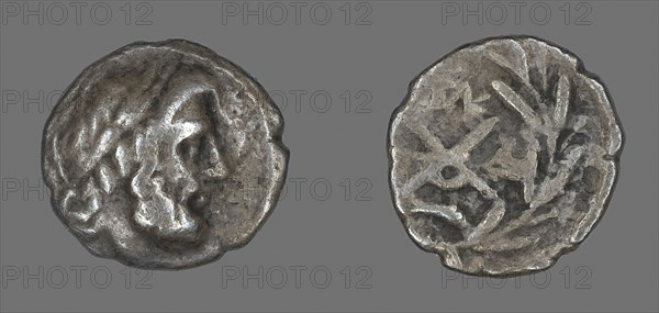 Hemidrachm (Coin) Depicting the God Zeus Amarios, 280/146 BC, Greek, minted in Dyme, Ancient Greece, Silver, Diam. 1.5 cm, 2.13 g