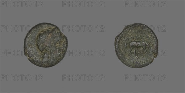 Coin Depicting the God Apollo, about 300 BC, Greek, Ancient Greece, Bronze, Diam. 1.5 cm, 3.68 g