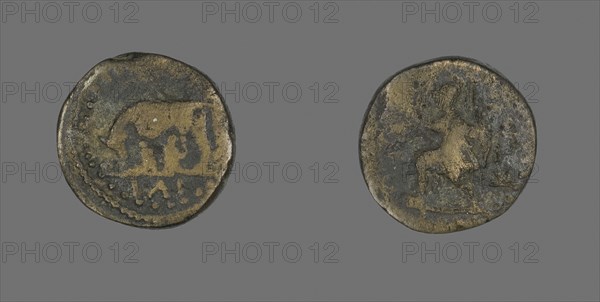 Coin Depicting a She-Wolf Nursing Romulus and Remus, AD 117/192, Roman, minted in Ilium, Troas, Rome, Bronze, Diam. 1.9 cm, 5.47 g