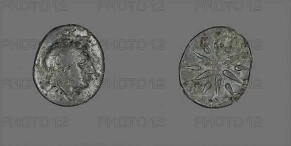 Coin Depicting the God Apollo, 4th century BC, Greek, Ancient Greece, Bronze, Diam. 1.8 cm, 3.08 g
