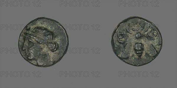 Coin Depicting the Goddess Artemis, 258/202 BC, Greek, minted in Ephesos, Ancient Greece, Bronze, Diam. 1.1 cm, 1.27 g