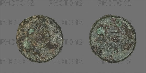 Coin Depicting the God Apollo, about 300/200 BC, Greek, Ancient Greece, Bronze, Diam. 1.2 cm, 1.89 g