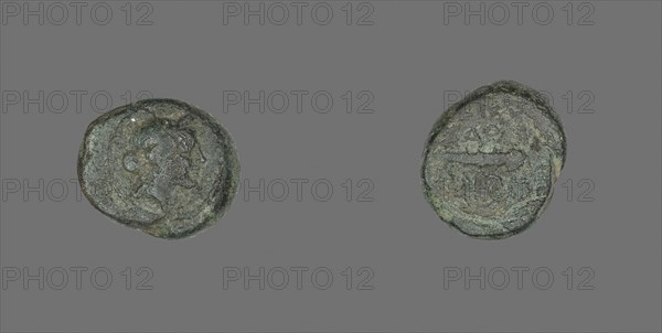 Coin Depicting the God Apollo, about 133 BC, Greek, Ancient Greece, Bronze, Diam. 1.5 cm, 3.93 g