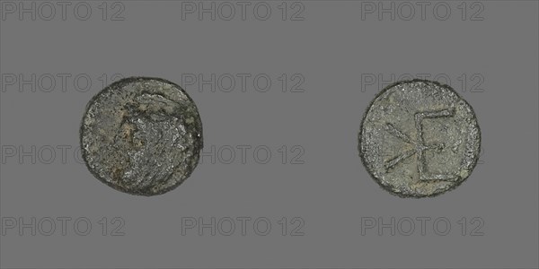 Coin Depicting Head of a Male, 400/310 BC, Greek, Ancient Greece, Bronze, Diam. 0.9 cm, 0.71 g