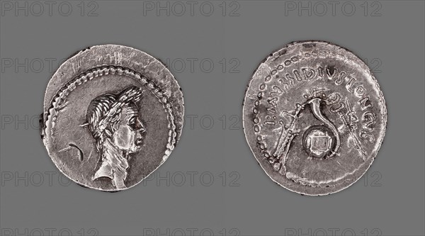 Denarius (Coin) Portraying Julius Caesar, 42 BC, issued by L. Mussidius Longus, Roman, minted in Rome, Rome, Silver, Diam. 2 cm, 3.83 g