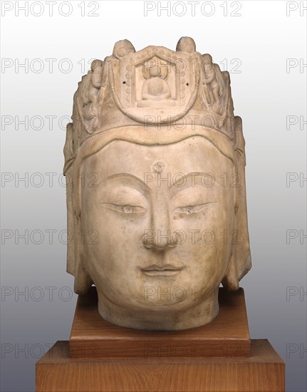 Head of Guanyin, late Northern Qi/Sui dynasty, late 6th century, China, Marble with traces of metal fittings at crown, 68.6 × 43.2 × 45.7 cm (27 1/16 × 17 1/16 × 18 in.)