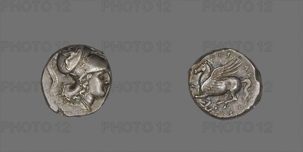 Stater (Coin) Depicting the Goddess Athena, 317/310 BC, Greek, Syracuse, Silver, Diam. 2 cm, 8.66 g