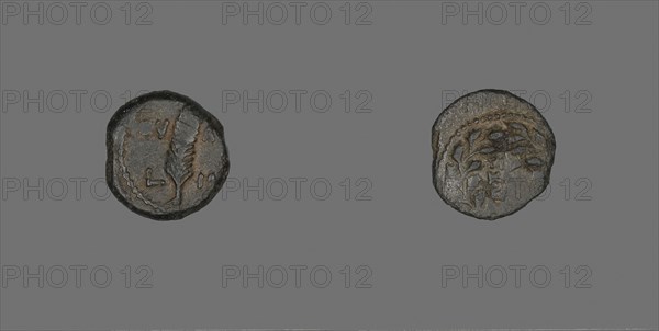 Coin Depicting a Palm Branch, AD 24/25, Procurator: Valerius Gratus (AD 24–25), reign of Tiberius, Roman, Palestine, Israel, Bronze, Diam: 1.6 cm, 2.01 g