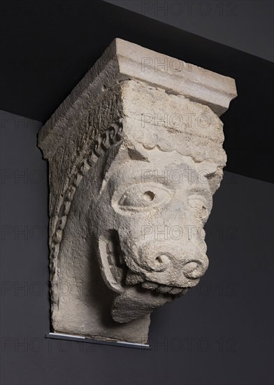 Corbel with Animal Mask with Protruding Tongue from the Monastery Church of Notre-Dame-de-la-Grande-Sauve, 1150/1200, French, Aquitaine, Limestone, 46.7 × 28.6 × 57.8 cm (18 3/8 × 11 1/4 × 22 3/4 in.)