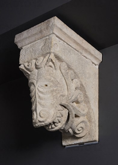 Corbel with Animal Mask Sprouting Leaves from the Monastery Church of Notre-Dame-de-la-Grande-Sauve, 1150/1200, French, Aquitaine, Limestone, 45.7 × 25.4 × 59.7 cm (18 × 10 × 23 1/2 in.)