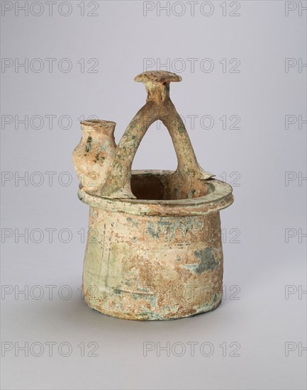 Wellhead with Water Bucket, Eastern Han dynasty (A.D. 25–220), China, Earthenware with green lead glaze, H. 22.4 cm (8 13/16 in.), diam.15.1 cm (6 in.)