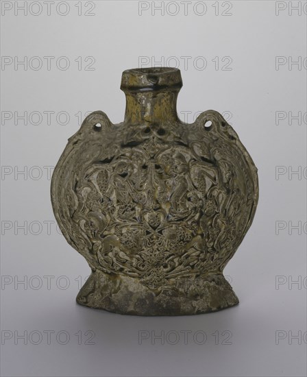 Pilgrim Flask (Bian Hu), Sui (581–618) or early Tang dynasty (618–907), c. late 6th/7th century, China, Stoneware with mold-impressed decoration under yellowish-brown lead glaze, 24.1 × 20.4 × 12.2 cm (9 1/2 × 8 × 4 13/16 in.)