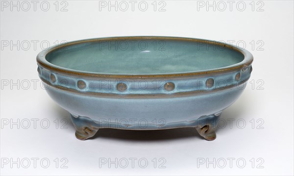 Circular Flowerpot Stand with Three Cloud-Shaped Feet, Jin dynasty (1115–1234), 13th century, China, Jun ware, stoneware with light blue glaze, H. 8.3 cm (3 1/4 in.), diam. 22.8 cm (9 in.)