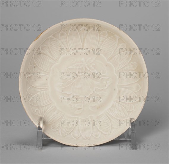 Dish with Lotus Flower and Petals, Song dynasty (960–1279), China, Stoneware with underglaze molded and carved decoration, H. 1.4 cm (9/16 in.), diam. 9.4 cm (3 11/16 in.)