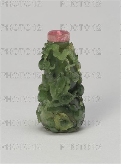 Gourd-Shaped Snuff Bottle with a Butterfly, Trailing Tendrils, and Fruit Branches, Qing dynasty (1644–1911), 1750–1800, China, Green jade (nephrite) with carved decoration, H. 6.7 cm (2 5/8 in.), diam. 3.3 cm (1 5/16 in.)
