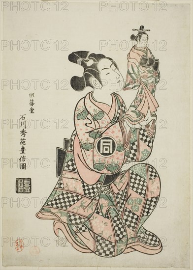 Sanogawa Ichimatsu I as a puppeteer, c. 1749, Ishikawa Toyonobu, Japanese, 1711-1785, Japan, Color woodblock print, chuban (left half of a horizontal oban), benizuri-e, 12 1/2 x 9 in.