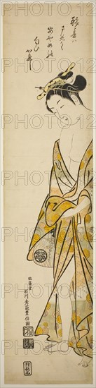 Young Woman after a Bath, c. 1745, Ishikawa Toyonobu, Japanese, 1711-1785, Japan, Hand-colored woodblock print, wide hashira-e, beni-e, 67.2 x 15.9 cm (27 x 6 3/8 in.)