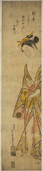 Young Woman after a Bath, c. 1745, Ishikawa Toyonobu, Japanese, 1711-1785, Japan, Hand-colored woodblock print, wide hashira-e, beni-e, 68.2 x 16.2 cm