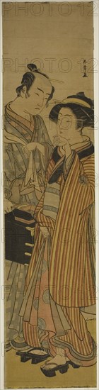 The Actors Segawa Kikunojo III as Okoma (right), and Arashi Sangoro III as the Hairdresser Obana Saizaburo (left), in the Play Koi Musume Mukashi Hachijo, Performed at the Nakamura Theater in the Third Month, 1776, c. 1776, Katsukawa Shunsho ?? ??, Japanese, 1726-1792, Japan, Color woodblock print, wide hashira-e, 69.3 x 16.5 cm (27 5/16 x 6 1/2 in.)