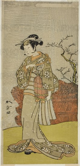 The Actor Yamashita Kinsaku II as Osaku (?) in the Play Onna Aruji Hatsuyuki no Sekai, Performed at the Morita Theater in the Eleventh Month, 1773, c. 1773, Katsukawa Shunsho ?? ??, Japanese, 1726-1792, Japan, Color woodblock print, hosoban, 31.4 x 14.9 cm (12 3/8 x 5 7/8 in.)