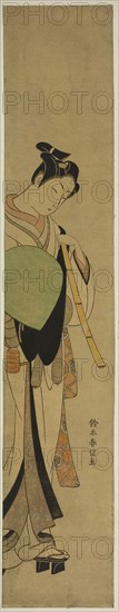 Young Man Dressed as a Mendicant Monk, c. 1770, Suzuki Harunobu ?? ??, Japanese, 1725 (?)-1770, Japan, Color woodblock print, hashira-e, 26 x 4 7/8 in.