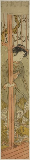 Young Woman Looking out from a Parlor, c. 1776, Isoda Koryusai, Japanese, 1735-1790, Japan, Color woodblock print, hashira-e, 26 1/8 x 4 5/8 in.