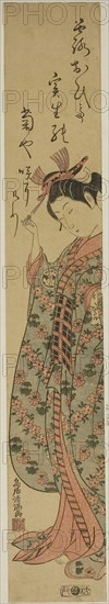 The Actor Segawa Kikunojo II as a woman holding a hairpin, c. 1760, Torii Kiyomitsu I, Japanese, 1735–1785, Japan, Color woodblock print, hashira-e, benizuri-e, 62.8 x 10 cm (24 5/8 x 4 in.)