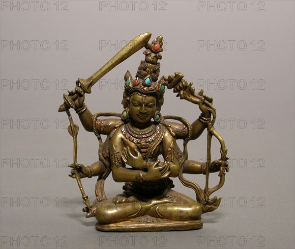 Guhyasamaja Manjuvajra, an Esoteric Form of Bodhisattva Manjushri, Pala period, 12th century, India, Bengal or Bihar, Bihar, Brass with silver, copper, turquoise, and coral inlay, 8.6 × 7.1 × 2.5 cm (3 3/8 × 2 13/16 × 1 in.)
