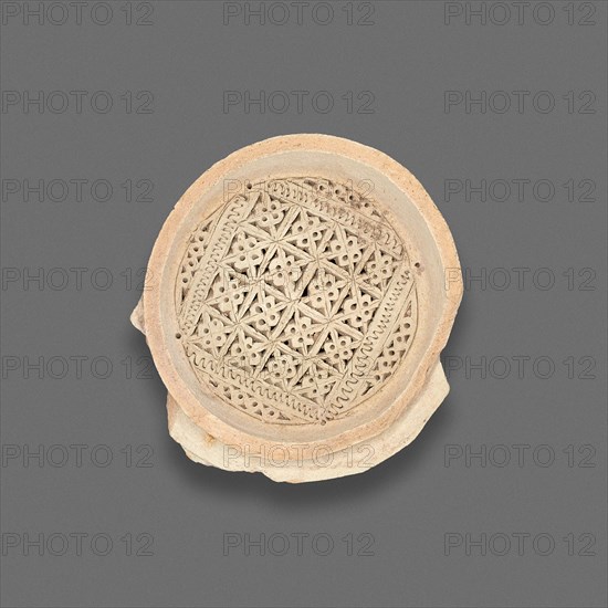 Clay Filter with punched and inscribed decoration, Fatimid dynasty (969–1171), 11th–12th century, Egypt, Fustat, Masr al-`Atiqah, Earthenware, carved and punched, 2.5 × 7.3 cm (1 × 2 7/8 in.)
