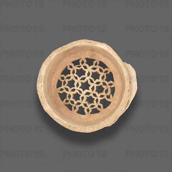 Clay filter with geometric design, Fatimid dynasty (969–1171), 11th–12th century, Egypt, Fustat, Masr al-`Atiqah, Earthenware, carved and punched, 875 × 6.4 cm (7/8 × 2 1/2 in.)