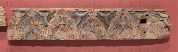 Fragment of an architectural molding, Marinid dynasty (1244–1465), 14th century, Morocco, Morocco, Wood with relief carving, 20.7 x 107.0 x 3.8 cm (8 3/16 x 42 1/8 x 1 1/2 in.)