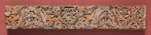 Fragment of an architectural molding, Marinid dynasty (1244–1465), 14th century, Morocco, Morocco, Wood with relief carving and traces of polychrome decoration, 20.3 x 119.9 x 6.3 cm (8 x 47 1/8 x 2 7/16 in.)