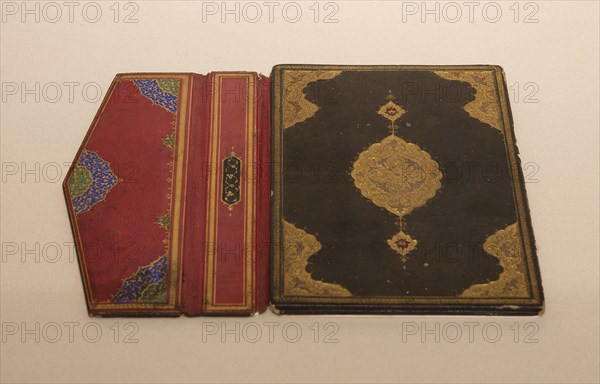 Qur’an cover, 17th century, Iran, Iran, Leather, exterior: embossed and gilt decoration, interior: filigree and gilt decoration, Overall: 19.4 x 36.2 x .125 cm (7 5/8 x 14 1/4 x 1/8 in.), Closed: 19.4 x 13.0 x .437 cm (7 5/8 x 5 1/8 x 7/16 in.)