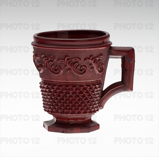 Cup with Handle, c. 1850, England, Glass, opaque red with relief decoration, H. 7.5 cm (2 15/16 in.)